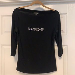 bebe boat-neck knit top with 3/4” sleeves